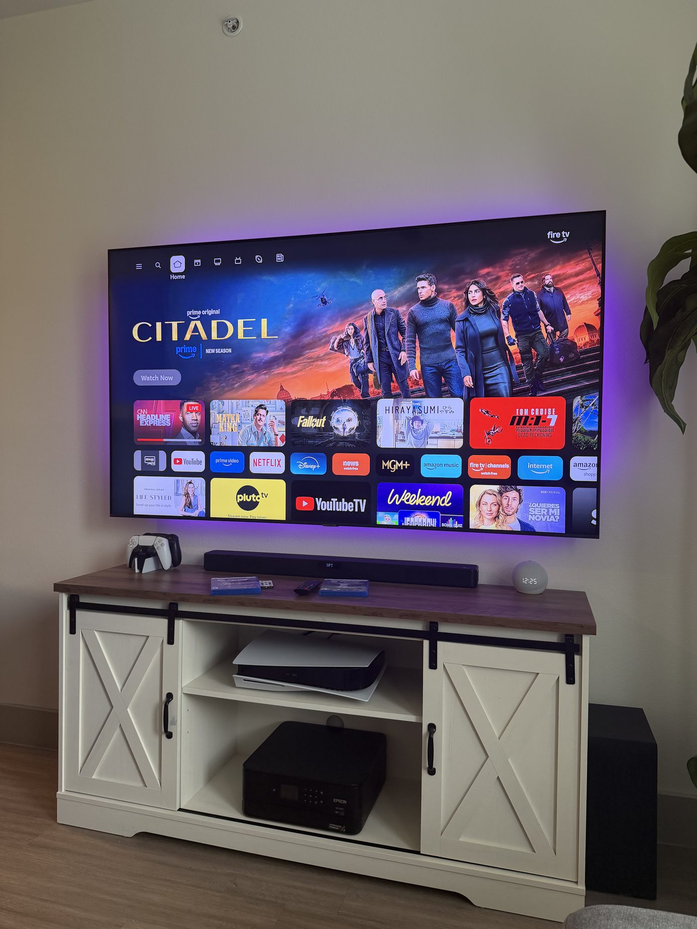 Large TV with Fire TV setup mounted on living room wall Dallas TX