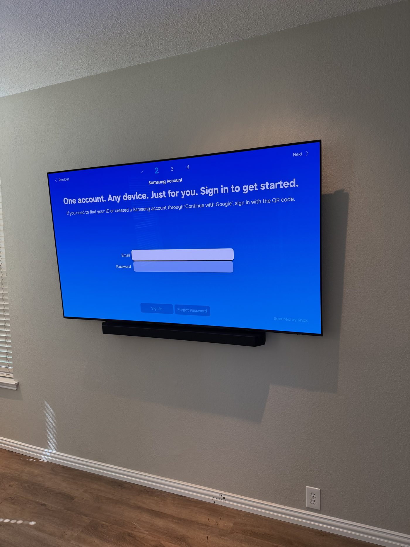 Samsung TV and soundbar clean wall mount on gray drywall Dallas TX