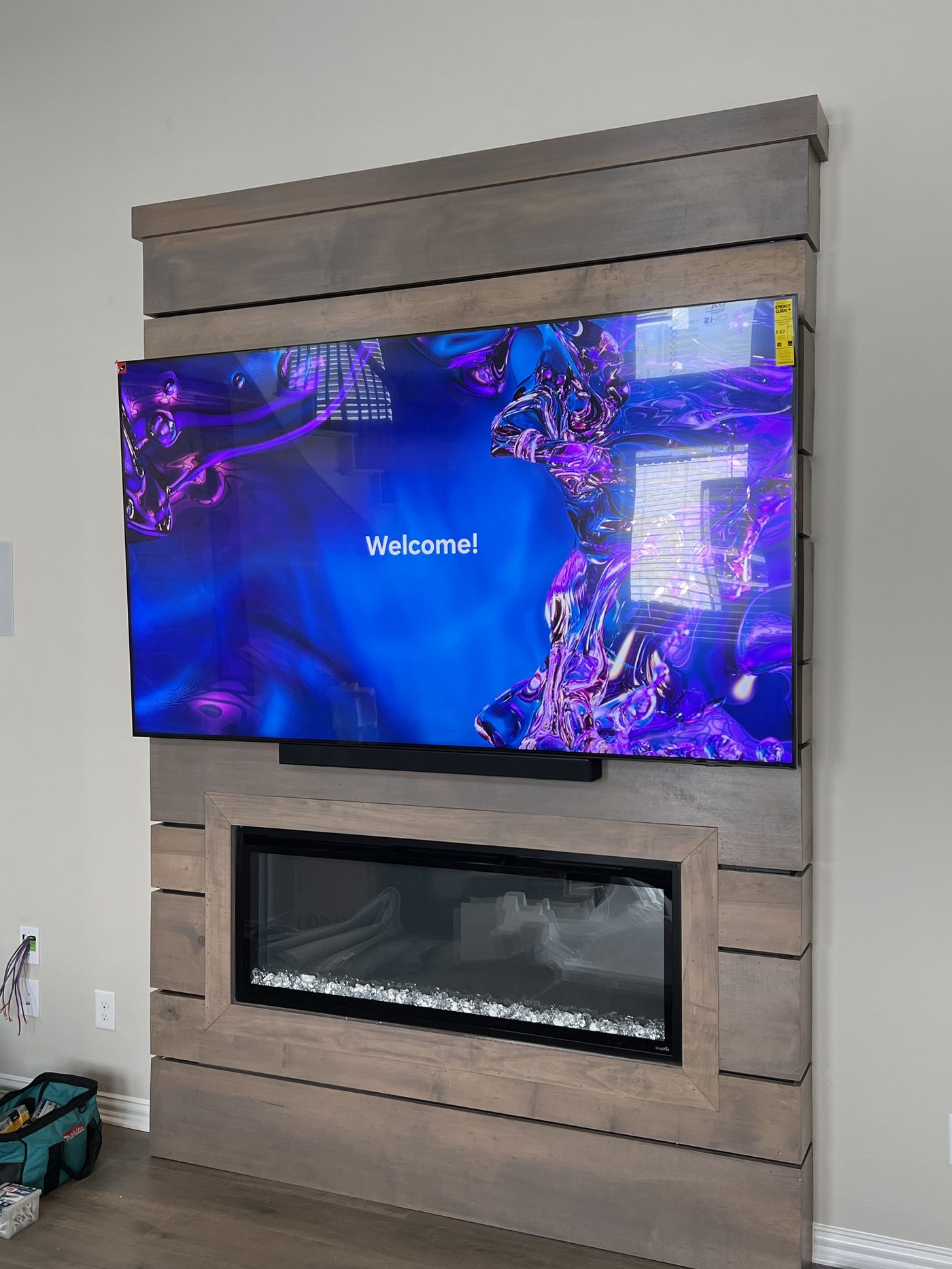 TV mounted on wood panel fireplace Addison TX - EZ TV Mounting